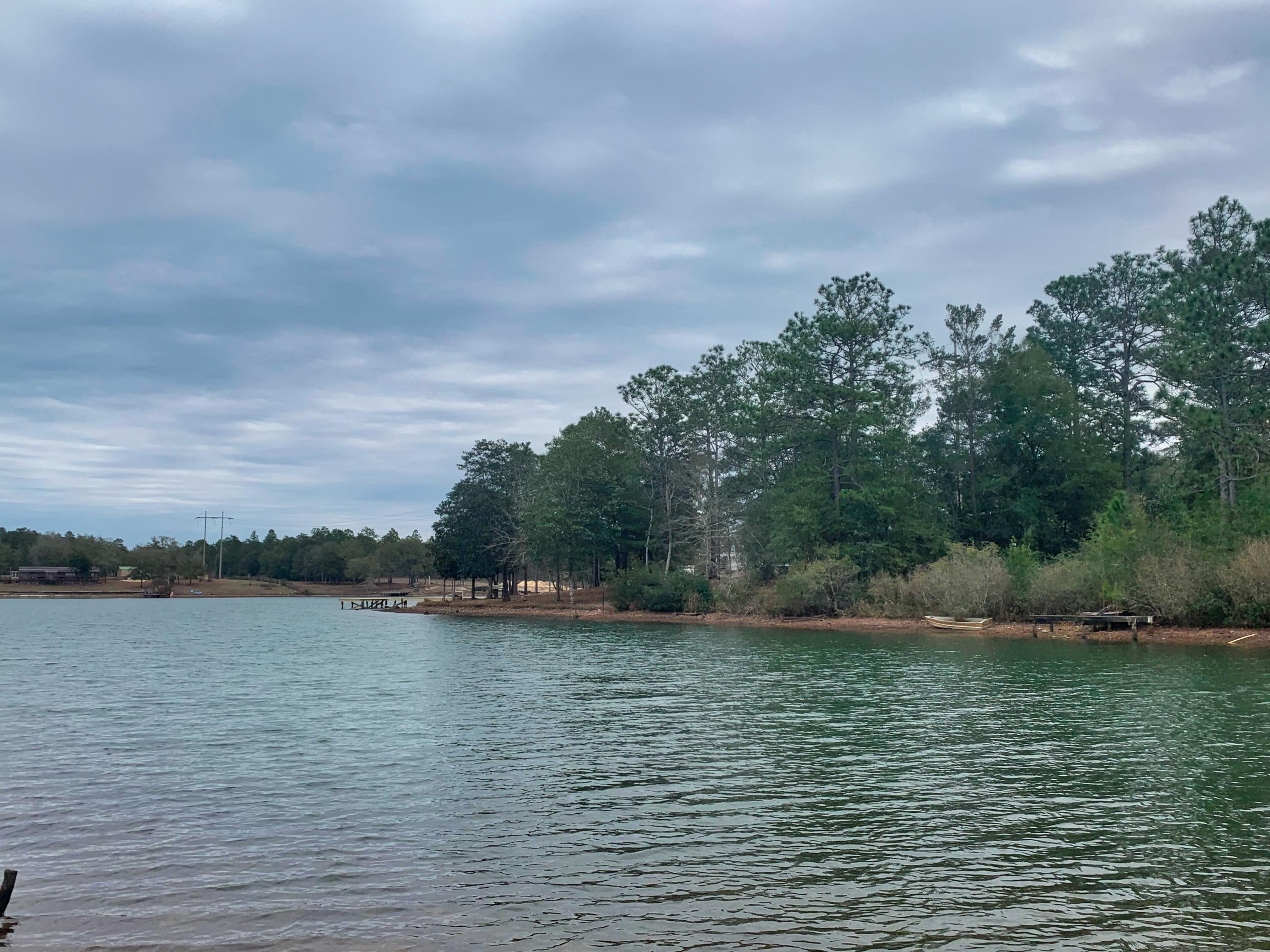 Fisherman's Paradise! Over an acre of cleared land that is ready for you to build your waterfront estate on! This lot has some of the best views in the entire neighborhood and almost 200 ft of waterfront. Huge bass are caught in this lake over 50 acre lake! One of, if not the largest lake in Crestview! This gorgeous neighborhood is tucked away but still conveniently located to the Interstate, 285 and Crestview!