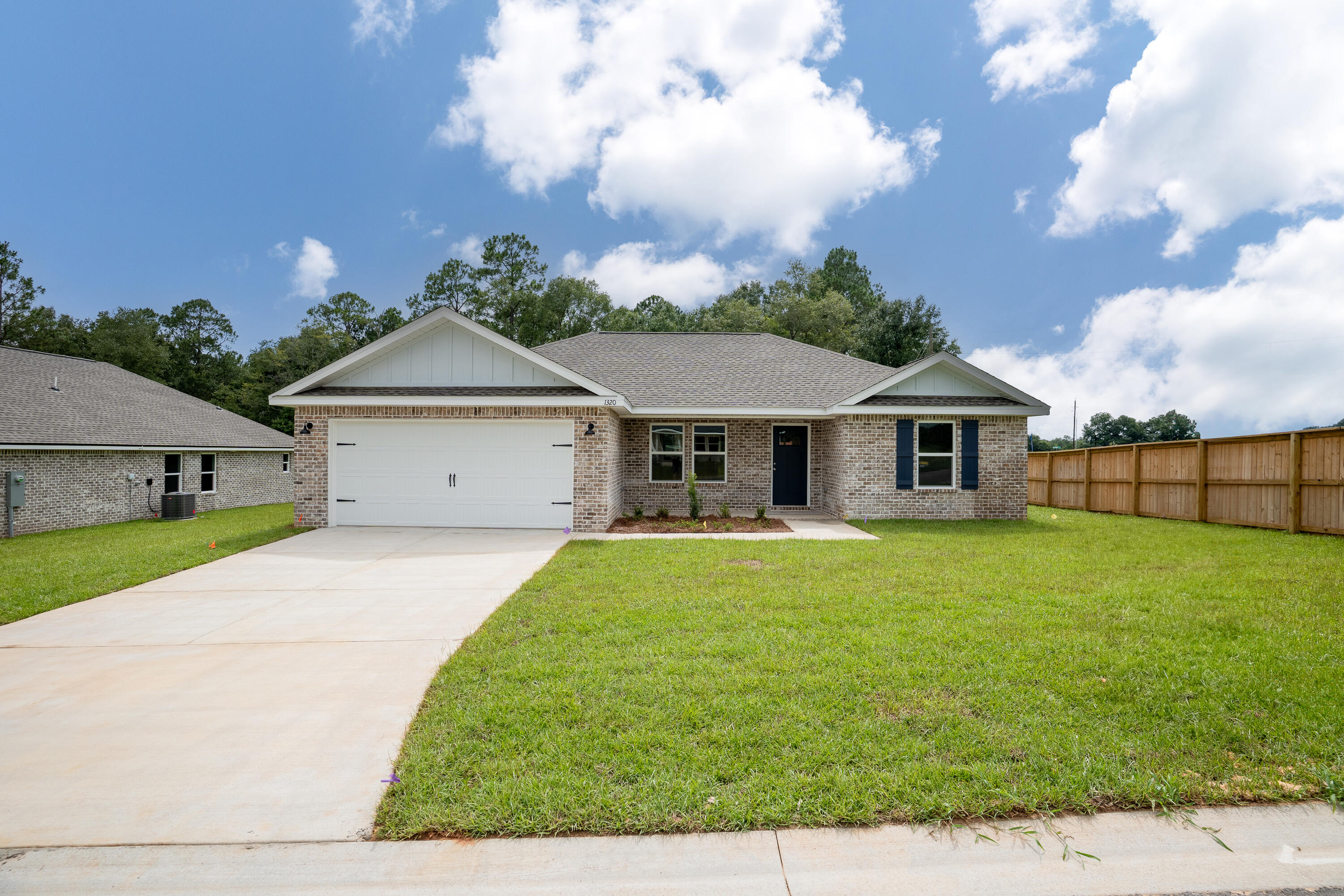 WHO NEEDS $15,000 ANYWAY MONEY TO GO FOR CLOSING COSTS/PREPAIDS/RATE BUYDOWN OR EXTRA APPLIANCES? If YOU DO then the ''ADALINE'' FLOOR PLAN WILL BE COMPLETE IN LATE JULY - Welcome to SOUTHERN DAY CHATEAU S/D IN BAKER FLORIDA! This all brick home features raised ceilings, recessed lighting, ceiling fans thru-out, luxury vinyl plank flooring, granite or quartz countertops, sprinkler system for the beautiful landscaped yard. Front and rear porches for relaxing. Kitchen has white shaker style cabinets, work island w/bar seating, cozy dining area, pantry and stainless steel appliances. Owners bath has walk-in closet, double vanities, shower only. Photo of similar completed home, interior/exterior colors will vary, front elevation may vary.
