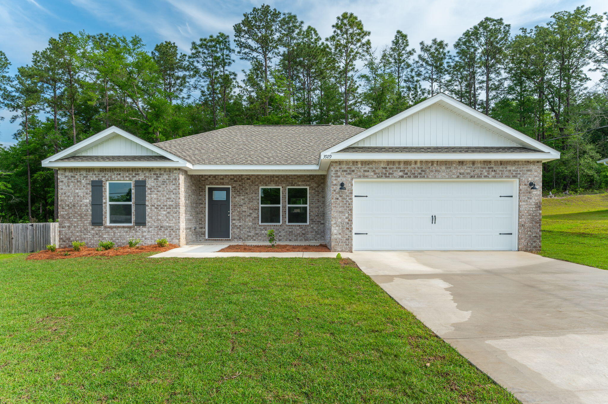 ''ADALINE'' FLOOR PLAN WILL BE COMPLETE IN LATE JULY - Still time to make some selections. Welcome to SOUTHERN DAY CHATEAU S/D IN BAKER FLORIDA! This all brick home features raised ceilings, recessed lighting, ceiling fans thru-out, luxury vinyl plank flooring, granite or quartz countertops, sprinkler system for the beautiful landscaped yard. Front and rear porches for relaxing. Kitchen has white shaker style cabinets, work island w/bar seating, cozy dining area, pantry and stainless steel appliances. Owners bath has walk-in closet, double vanities, shower only. Seller will contribute up to $10,000 towards buyers closing costs/prepaids or rate buydown (restrictions apply) Photo of similar completed home, interior/exterior colors will vary, front elevation may vary.