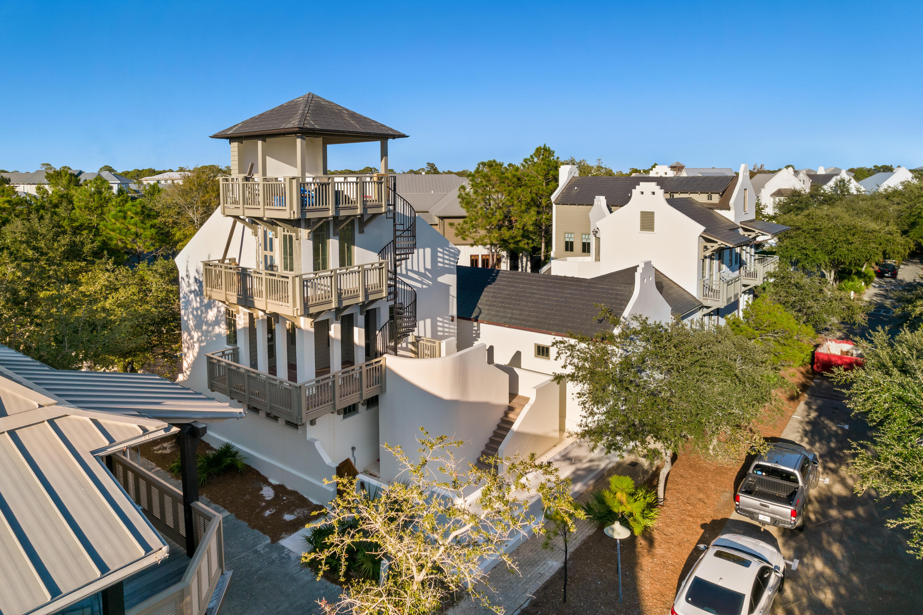 Situated on one of the largest home-sites in Rosemary Beach, 102 W Water Street presents astonishing architecture in the most sought after community on scenic highway 30A. Extraordinary design characterizes this fully renovated, like-new estate. The expansive gated compound showcases gulf views; an oversize pool and spa; a large main house; spacious guest house; multiple fireplaces; unexpected outdoor living; a roof top terrace and a two car garage all within the privacy walls of the property. Positioned on the corner of W Water and Johnson, this home offers seven bedrooms, seven full bathrooms and one half bathroom. Curated perfectly for primary or secondary living; design features of the home include venetian plaster, white-oak custom cabinetry, shell-stone flooring on the main level and