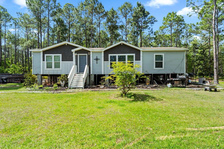 Peaceful 1-acre retreat with potential! Nestled in a quiet setting, this 2019 mobile home offers a great layout and a prime location--just waiting for your personal updates. Whether you're looking for an opportunity rental, or affordable primary home, this could be the opportunity you've been searching for. Enjoy space to roam, privacy, and endless possibilities--all within easy reach of all the area offers. Don't miss out!