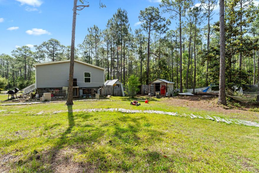 Do NOT use as a comp- significant permitting and repair issues to close. Buyer paid for repairs prior to closing to close. Peaceful 1-acre retreat with potential! Nestled in a quiet setting, this 2019 mobile home offers a great layout and a prime location--just waiting for your personal updates. Whether you're looking for an opportunity rental, or affordable primary home, this could be the opportunity you've been searching for. Enjoy space to roam, privacy, and endless possibilities--all within easy reach of all the area offers. Don't miss out!