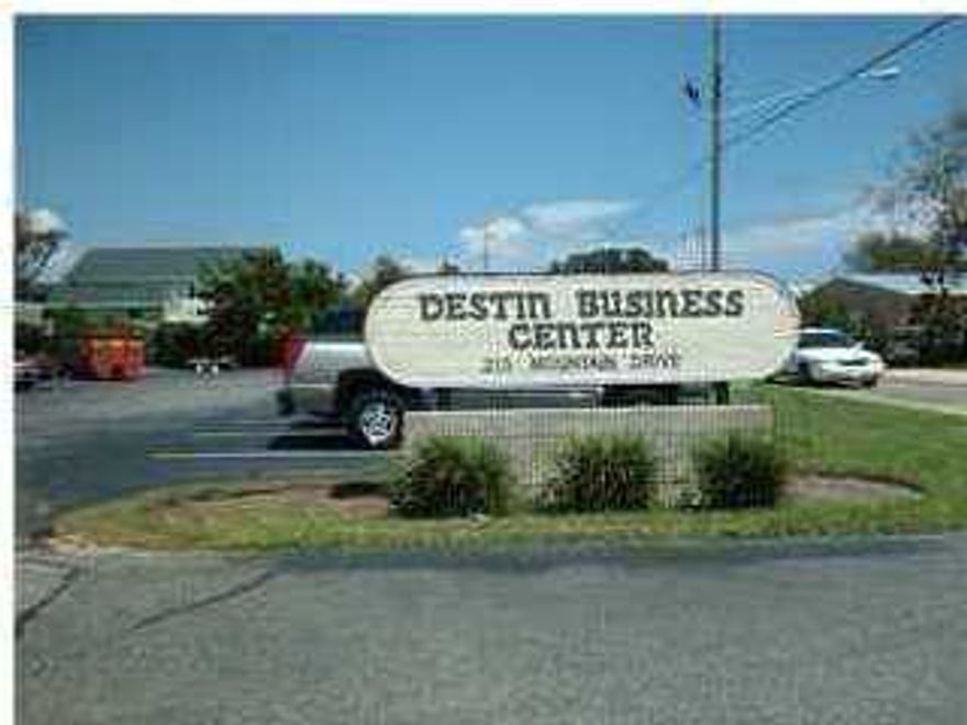 Quality office space coming available March 2013 in great condition in the Heart of Destin in prestigious Destin Business Center complex. Super low rent fee is driven by desire to rent -not by condition. The unit space and public space are in great shape. Common area has grand atrium, ample parking, signage, and two public restrooms convenient to this office space. The unit is conveniently located directly in front of the side entrance where most of the parking spaces are. It is divided into four very large offices plus a reception area and a private bathroom. The unit has a classy glass front, brand new roof, & a new A/C.