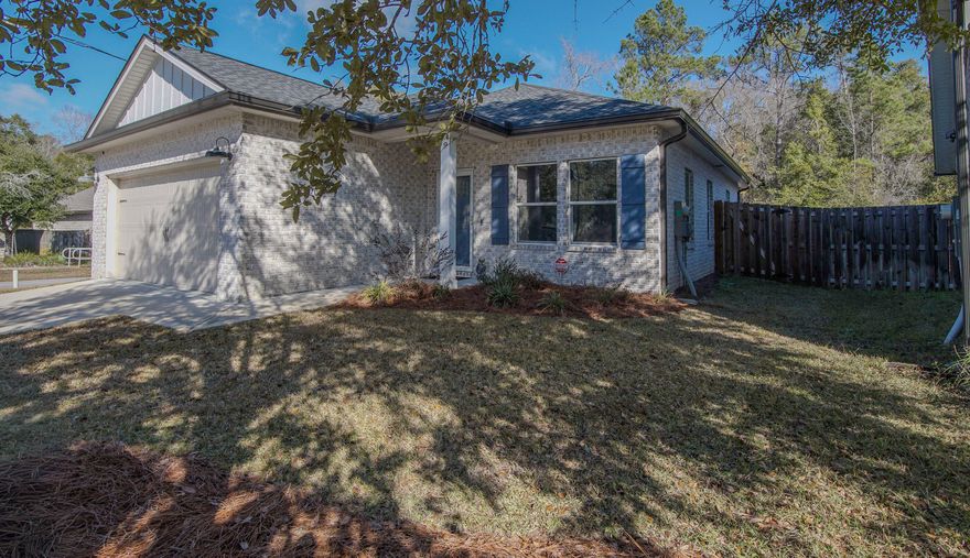 Turn-key, thoughtfully upgraded, and exceptionally well maintained, this all-brick Craftsman-style home offers easy single-level living in a quiet Laurel Oaks subdivision. Originally purchased as new construction on July 26, 2023, the home has been lightly used as a seasonal residence and enhanced with numerous functional upgrades since purchase.The open-concept floor plan flows through the great room, kitchen, and dining area, featuring raised ceilings, recessed lighting, and luxury vinyl plank flooring in the main living spaces, with carpeted bedrooms for added comfort. The kitchen offers white shaker-style cabinetry, quartz countertops, stainless steel appliances, pantry storage, and bar seating. Several cabinets have been upgraded with slide-out shelving for improved accessibility and organization, and the kitchen is conveyed fully equipped.

The primary suite includes a walk-in closet, double vanities, and a tiled walk-in shower, while the guest bathroom features a tub/shower combination. Comfort-height toilets have been installed throughout the home, all closets include lighting, and the laundry room has added shelving. Washer and dryer convey.

Since purchase, the attached garage has been fully insulated to match the rest of the home, including an insulated garage door, and includes a water shut-off. Additional upgrades include a screened rear porch, Ring doorbell, alarm system, remote thermostat, window treatments/blinds, garbage disposal, and irrigation system with a separate well. The home sits on a corner lot with a privacy-fenced backyard and is surrounded by similarly maintained homes within the subdivision.

Offered fully furnished, with furnishings purchased new in 2023, including televisions, linens, and a fully stocked kitchen, this home is truly move-in ready and ideal for a snowbird or second-home buyer seeking a low-maintenance, turnkey property. Located in Flood Zone X.

Conveniently located south of Hwy 20 near Hwy 331, Laurel Oaks provides easy access to Freeport conveniences while remaining a comfortable drive to coastal destinations.