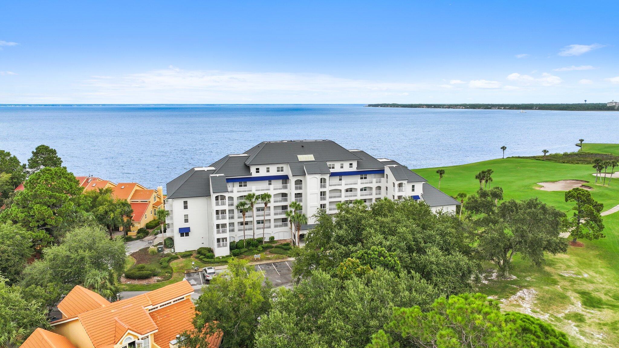 Stunning views overlooking the Intercoastal Waterway & #9 Links Golf Course. Enjoy a true resort lifestyle in the 2700+/- acre Sandestin resort located on a peninsula between the ICW and the Gulf of Mexico. Golf cart to Fine Dining, Shopping, Grocery, Marina, Entertainment, Tennis, 4 Championship Golf Courses and so much more! 28 Unit building has just completed a $1.7 million Renovation and is in compliance with new Florida law for Structural / Engineering & Reserve requirements. All Assessments paid and none on the horizon! Beautiful renovation including matching quartz in Kitchen & Baths, Paint, Fixtures, furnishings and decorating. Unit is one of 6 with 300+/- sq ft deck overlooking ICW. Plenty of room for outdoor entertaining. All furnishings convey. Est Rental income of $85K.