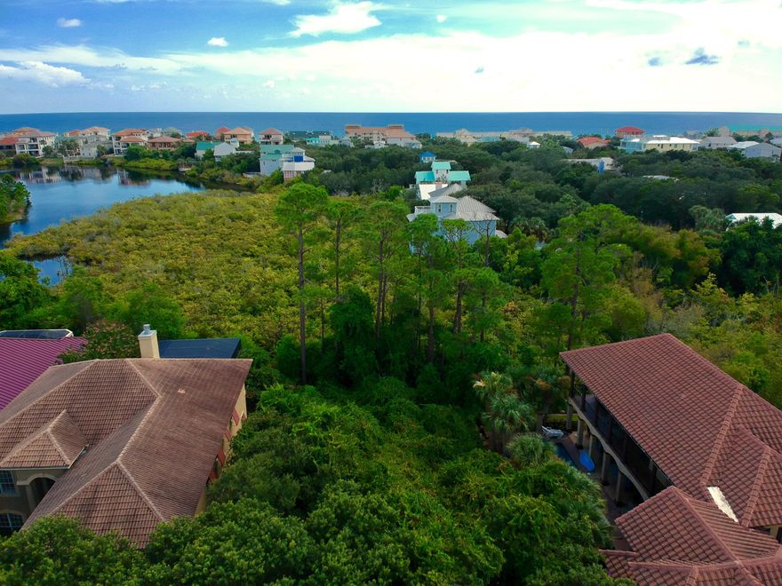 REO ~ Come Build Your Dream Home! This vacant lot is situated in the exclusive gated community of Destiny. Across the street from the Crab Trap the community offers a spacious clubhouse with pool, hot tub, tennis courts & fitness center. The lot sits on a cul-de-sac at the end of Paradise Isle offering plenty of privacy.