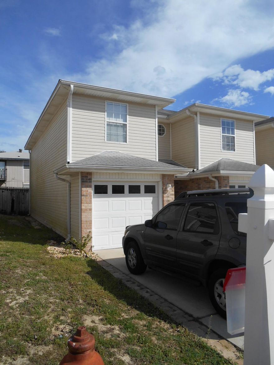 Perfect location just 1.2 miles West of Hurlburt Main gate on the North side of 98. This is not your normal Keystone townhome. Upgrades include New Engineered Wood Flooring downstairs, New Thick Neutral Colored Carpet with Waterproof 3M Padding, New Wood Look Tile Flooring in Master Bath, New Heat Pump unit, New Water Heater, Barn Door to Huge Walk in Closet with Custom Shelving in Master BR, Tile Shower with Glass Enclosure and Hand Held Shower Head, Bluetooth Speaker in Water closet, New Stainless Steel Kenmore Appliances with Warranties, Front and Back Retractable Screen Doors, Delta Kitchen Faucet with Deep Sink and Disposal, Granite/Quartz Double Vanity w/Power Strip, Pull down Stairs to Attic Storage with Additional Decking and Spray Foam Insulation, Large Garage with Epoxy Finish.