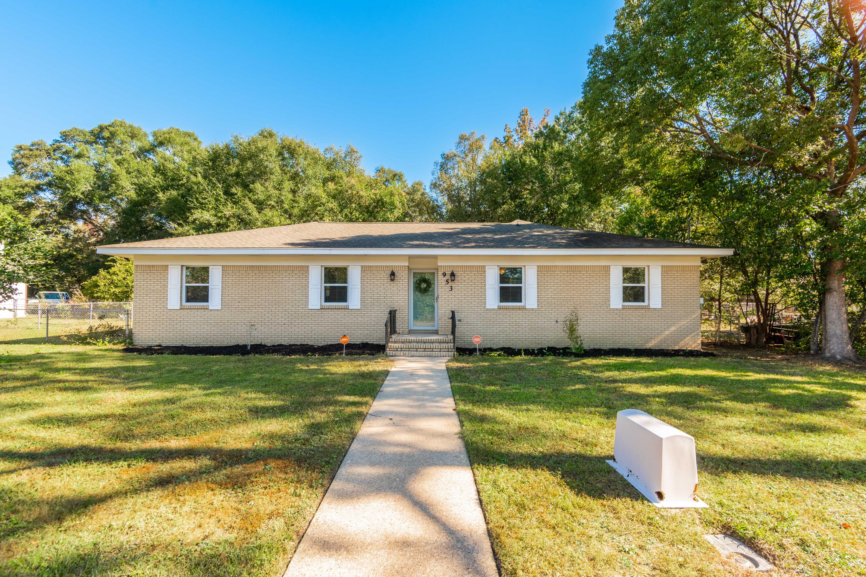 Welcome home to this beautiful, blonde-brick, 3 bedroom, 2 bath located in the heart of Crestview! Well-maintained with some nice upgrades and unique features--this home has two living spaces, with the updated kitchen featuring stainless, French-door refrigerator, stainless wall oven and dishwasher, smooth cook-top; lovely granite counter tops with shades of gray to complement the two-tone wood cabinets. The kitchen bar has seating for 3 or more and opens to the family room. There is a passageway from the kitchen to the formal dining space & formal living room area, perfect for entertaining or a quiet space. The large front room also has a sliding door to the foyer (a sleek, modern version of a barn door that really elevates the space). Home and garage also accessible from the rear alley