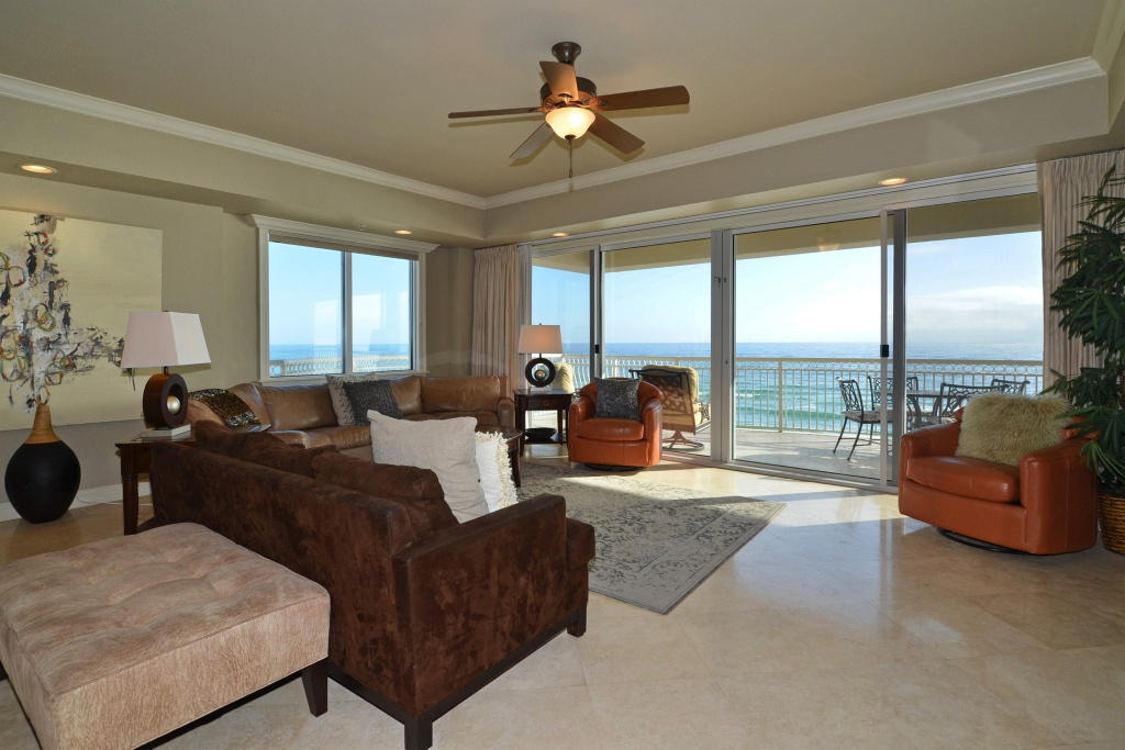 Gorgeous, 4 bedroom/4 bath condo in the exclusive Dunes of Crystal Beach. There are only 20 units in this building. This exceptional unit is the 4th floor penthouse on the desirable east end of the building. This is a corner unit with two walls of windows in the main living area, allowing for outstanding views! The kitchen is a gourmet chef's dream with commercial grade stainless steel appliances, granite counters and tumbled stone backsplash. The 42'' refrigerator is brand new! The spacious living area with travertine floors leads to an oversize gulf front balcony with commanding views east and west. The large master bedroom also has access to this balcony. The master bathroom has travertine and granite finishes. All other bedrooms and baths feature handsome appointments.