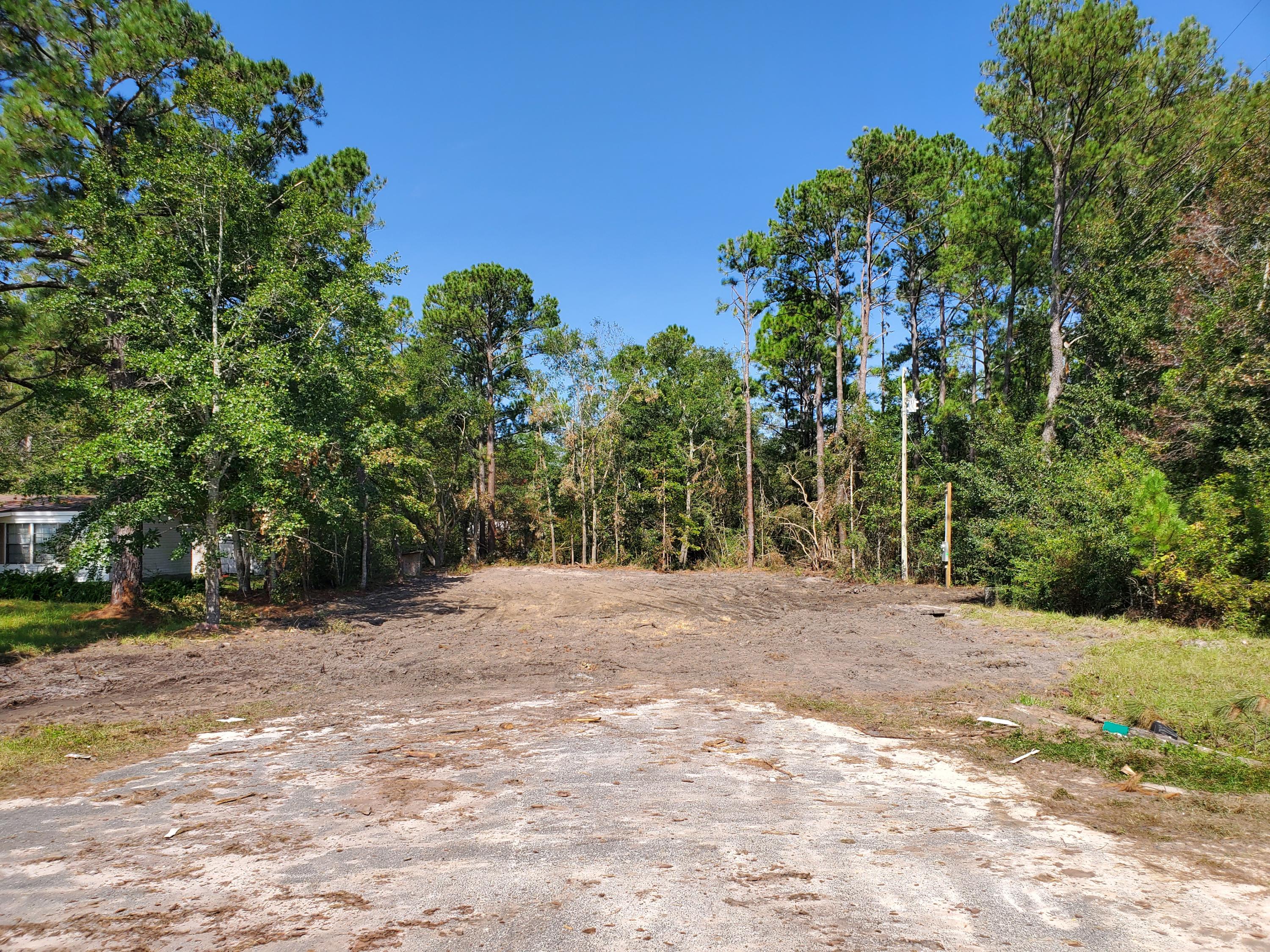 MAJOR PRICE IMPROVEMENT OF $30,000.00Catch the incoming traffic headed to the Beaches of South Walton. 100 Ft of US 331 Frontage. Lot lies 100 Ft North of CR 3280 and has a Median Cut just North of property. Property also fronts navigable canal. Lot has recently been cleared but retains well, septic and power pole. Flood Zone X. Seller is licensed Florida Real Estate Broker.