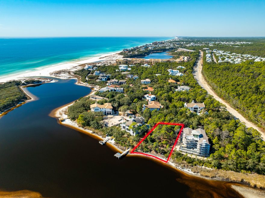 Rare dune lake lot with stunning lake and gulf views .Discover a once-in-a- lifetime opportunity to own a premier homesite in the prestigious, gated enclave of Redfish Lane, home to just 18 exclusive residences. This exceptional lot boasts unparalleled views of Little Redfish Lake and the Gulf of Mexico, offering a serene and breathtaking backdrop for your custom luxury home.  Nestled between the pristine white sands of the Gulf to the south, and the tranquil waters of Little Redfish Lake and Grayton Beach State Park to the east, this location offers both seclusion and natural beauty. Outdoor enthusiasts will love the hundreds of acres of preserved land to the north, perfect for exploring nature trails, kayaking, and birdwatching. Design and build your dream home with expansive lake and gulf views, surrounded by the beauty of one of the most sought-after coastal communities on the west end of 30A. Don't miss this rare opportunity to own a piece of paradise!

