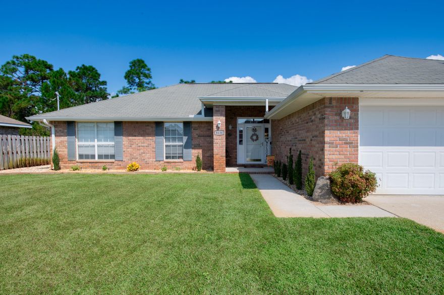 Check out this gorgeous East Navarre home conveniently located close to military bases, the beach, restaurants, and schools. *Brand new roof being installed in November!* The first thing you will notice when you pull up to this home is the curb appeal! There is plenty of parking with the extended driveway leading up to the double gate with easy access to the back yard. Gutters have recently been added! New wifi connected garage door will open and close with your phone! As you step inside this home, you will notice the open ''feel'' with plenty of space for larger furniture. The kitchen features stainless steel appliances. The master bedroom is off the kitchen, separated from the other 3 bedrooms for privacy.  The master bathroom has a double vanity, soaking tub and separate shower.