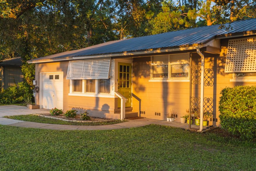 Check out this updated Florida Cottage in Garnier's Beach neighborhood!  Perfect for the outdoor lifestyle enthusiast! Enjoy the firepit in the large, fenced backyard or take a half-mile neighborhood walk to Garnier's Beach Park where you can bring your dog, play on the playground, launch a small boat or paddleboard!  The home has a metal roof (2009), double pane windows (2015), gas hot water heater (2017), HVAC (2017), color changing recessed lighting, whole-house rewire Fall/2020!  The one car garage even has an electric charging station!  The interior features a modern kitchen and bathroom with the authentic charm of shiplap ceilings and recessed panel doors!  Home does require flood insurance.  Buyer to verify all dimensions and information.