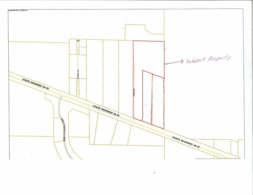PRICE REDUCTION!!!! This Residential/Mixed-Use development property is located directly on Hwy 20, the major East/West traffic corridor servicing areas including Freeport, Niceville and Panama City. The best use for this property, with approx. 420' of frontage, is for a Multi-Family project with a Commercial out-parcel in front. This property is right across the street from the Hammock Bay entrance. There is a significant demand increase for affordable housing/apartments in this area. There is also a demand for housing for the service sector residents working in the southern portion of the county where rental prices are high. The site is wooded, level with no wetlands. There is a home on the property that will be delivered ''vacant'' and in the ''As Is'' condition.