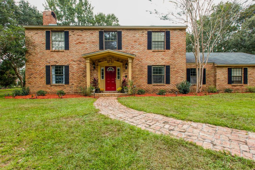 This colonial-style home boasts large rooms and tons of upgrades! The merlot-colored front door (new in 2017) leads you to the open, bright two-story foyer. The extra storage begins here with a hidden oversized closet beneath the stairs beside the half bath (renovated in 2015). To the left is a living room sized to easily fit the largest furniture you have. Grab a book from the built-in bookshelves on either side of the window seat and snuggle up to the wood-burning fireplace. Venture into the fully upgraded kitchen (2016) where you'll find plenty of light and an island featuring a butcher block styled countertop for the true chef in your family... This colonial-style home boasts large rooms and tons of upgrades! The merlot-colored front door (new in 2017) leads you to the open, bright two-story foyer. The extra storage begins here with a hidden oversized closet beneath the stairs beside the half bath (renovated in 2015). To the left is a living room sized to easily fit the largest furniture you have. Grab a book from the built-in bookshelves on either side of the window seat and snuggle up to the wood-burning fireplace. Venture into the fully upgraded kitchen (2016) where you'll find plenty of light and an island featuring a butcher block styled countertop for the true chef in your family. The island is surrounded by upgraded appliances (2014), granite countertops (2016), lots of cabinet space and a breakfast nook. To the right is your large dining room with plenty of light and new flooring (2014). Just beyond the kitchen is a bedroom that includes a huge closet and direct access to the kitchen, carport, and laundry room.  In the laundry room, you'll find plenty of countertop and cabinet space, a sink, and an ironing board closet. Upstairs to the right are two more additional bedrooms each with their own upgraded bathrooms (2015) and large closets. The master bedroom is on the opposite side upstairs with room enough for all of your bedroom furniture plus some! The bathroom hosts even more cabinet space and granite countertops for both vanities (2015). Both the garden tub and the walk-in shower were renovated in 2015. New roof in 2014 with reinforcement, storm shutters, and new egress door added in 2017 with the Rebuild NW Florida project.  The large yard includes a circle driveway to accent the easily manicured landscape. Stay straight on the driveway to take you to the oversized 2-car carport with a fully enclosed storage room. Just a few more steps will lead you to the huge ~12x20 ft workshop with loft space and awning for a 4-wheeler and/or lawnmower. The backyard is also large and becomes a paradise as you grill on the open patio or dine in the covered patio. New HVAC units and hot water heater in 2015. Washer, dryer, and freezer in laundry room do not convey. Intercom/speaker and sprinkler systems convey as-is.