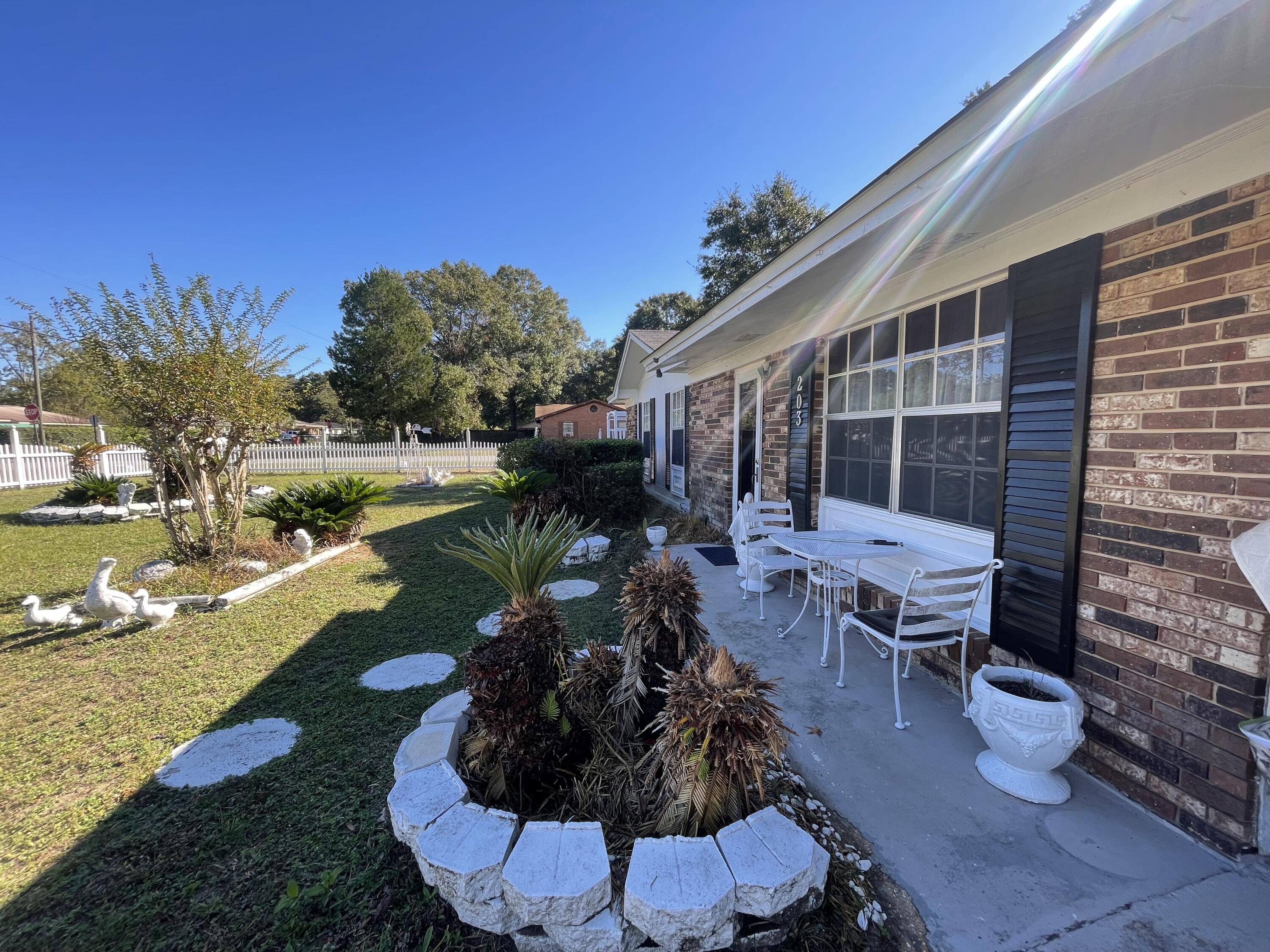 This charming brick home offers endless potential for the right buyer. Nestled on a spacious corner lot with a large yard, it's perfect for outdoor living, gardening, or even future expansion. The property features a carport for convenient parking and a newer roof for added peace of mind. While this older home needs some TLC to bring it to its full glory, it presents a fantastic opportunity for investors, flippers, or anyone looking to create their dream space. With its solid construction and bones, this property is ready for a fresh vision. Don't miss this chance to own a home with character and plenty of possibilities. Schedule a showing today and imagine the future!