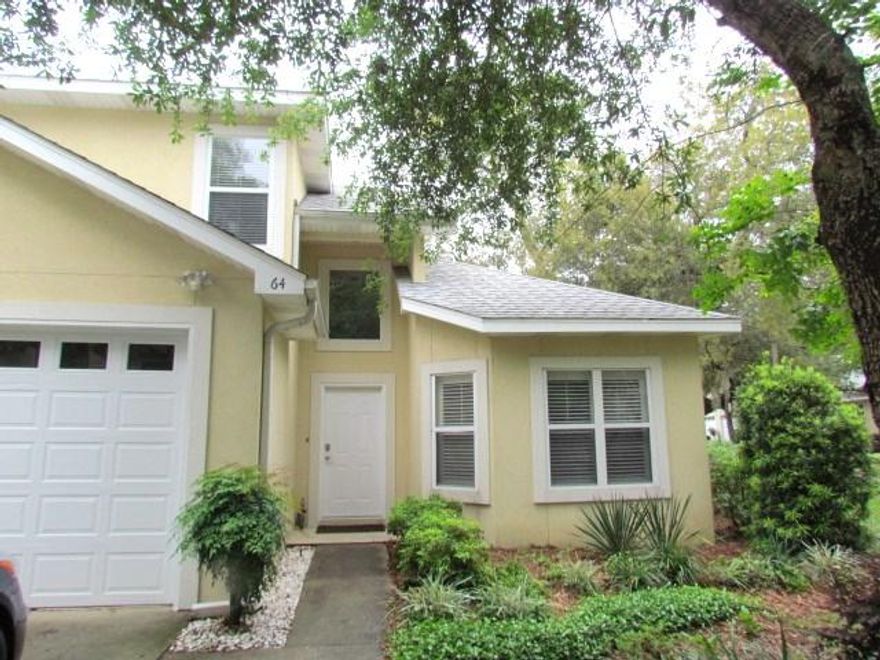 Beautiful townhome with Bay view in the quiet Chacato Landing area of Bluewater Bay. This is a premier corner lot with no lawn maintenance required. 3 bedrooms and 2 and a half baths with a downstairs master and ensuite bathroom. Enjoy the view of the bay while you cook dinner or sit at the table in the eating area. Beautiful hard wood stairs lead up to two bedrooms and a full bath, plus a heated and cooled storage room. Kitchen has solid surface counter tops, warm wood cabinets and a gas stove for that chef in your family. Master and one bedroom have neutral carpet while one bedroom has wood laminate flooring, perfect for a home office or craft room! Enjoy the screened porch on the back of the home, perfect for entertaining almost year round! 2 car garage with automatic opener.