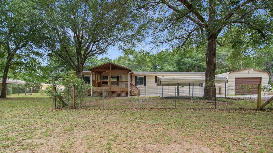 Completely remodeled spacious doublewide mobile home, sits on 1.367 acres. This home has lots of room for growing families. There are 4 bedrooms, 2 full baths and one-half bath. There are covered porches on the front and back of home.  This home has crown molding and real sheetrock, no strips! The kitchen features Granite countertops, a new stove, microwave, and dishwasher, new Central Air Conditioning!  These are just some of the great features of this home. Come see it before it's gone! Information deemed reliable but not guaranteed.  All measurements to be verified by buyer.Listing agent has personal Interest in property.