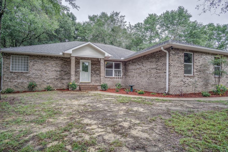 Fresh neutral paint and landscaping! Custom Mike Josey Construction situated on a quiet street in North Crestview. Built in 2003 on a half acre lot, this all brick home features 3 bedrooms and 2 bathrooms with an office. Kitchen boasts custom Oak cabinets, Silestone-Granite countertops, tile flooring, and a gas stove. Spilt floor plan with a great size Master bedroom that has a connected 10x10 sitting room. The Master bath has a walk-in steam room/shower combo and a good size walk-in closet. Wood laminate in all the bedrooms and porcelain tile in the living room, kitchen, and bathrooms. The neighborhood features 2 lakes for the homeowners to enjoy!