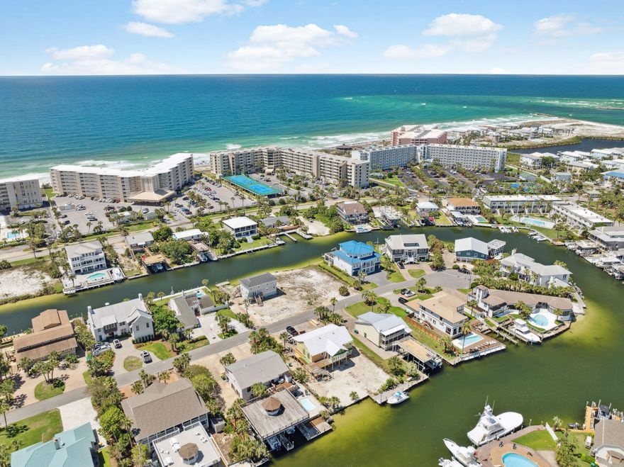 Calling all boaters and builders! Here is your opportunity to own one of the last remaining vacant lots in Holiday Isle. Enjoy nearly 90 feet of canal frontage in the heart of Destin, offering quick access to Destin's ''East Pass'' and the Gulf of America. Destin is known as the ''World's Luckiest Fishing Village.'' Schedule your showing today.