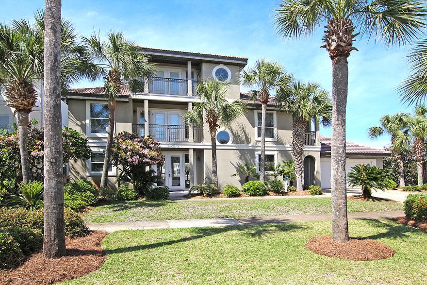 Tortuga is a three story lakefront home in the exclusive community of Dunes of Destin, perfect for primary or vacation home. The 3100 square feet of living space includes a beautifully remodeled kitchen with two dining areas, a spacious living room, laundry room, four bedrooms, and four updated bathrooms. Three of the bedrooms have a private balcony. The house sleeps 20 with the sleeper sofas. There is new paint inside and out and a new air conditioner was installed in 2015. Walk out the back door and relax on the terrace overlooking the lake or out the front door and take a short stroll to the white sand beaches of Destin. House is sold completely furnished for immediate occupancy or rental. (All dimensions to be verified by buyer.