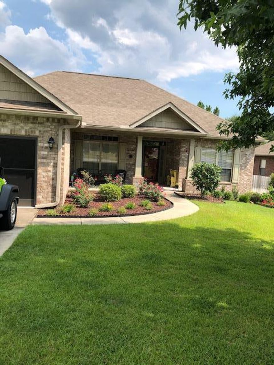 Located south of Interstate 10. This home offers an abundance of space . AS you enter the front door you are welcomed by a large foyer which flows into the famiy room with an open concept kitchen with dining area. The kitchen has granite counters tops with tile back splash.and stainless steel appliances. There is a large pantry for your essentials. This home has a formal dining room and 3 bedroom split floor plan.Master bath has double vanity, Granite counter tops and back splash, garden tub, separate shower and two walk in closets. Beautiful fenced in back yard.Screen Door on Garage. Storm doors on Front and Back doors.This home has it all, too many up grades to list. This is a must see Home .