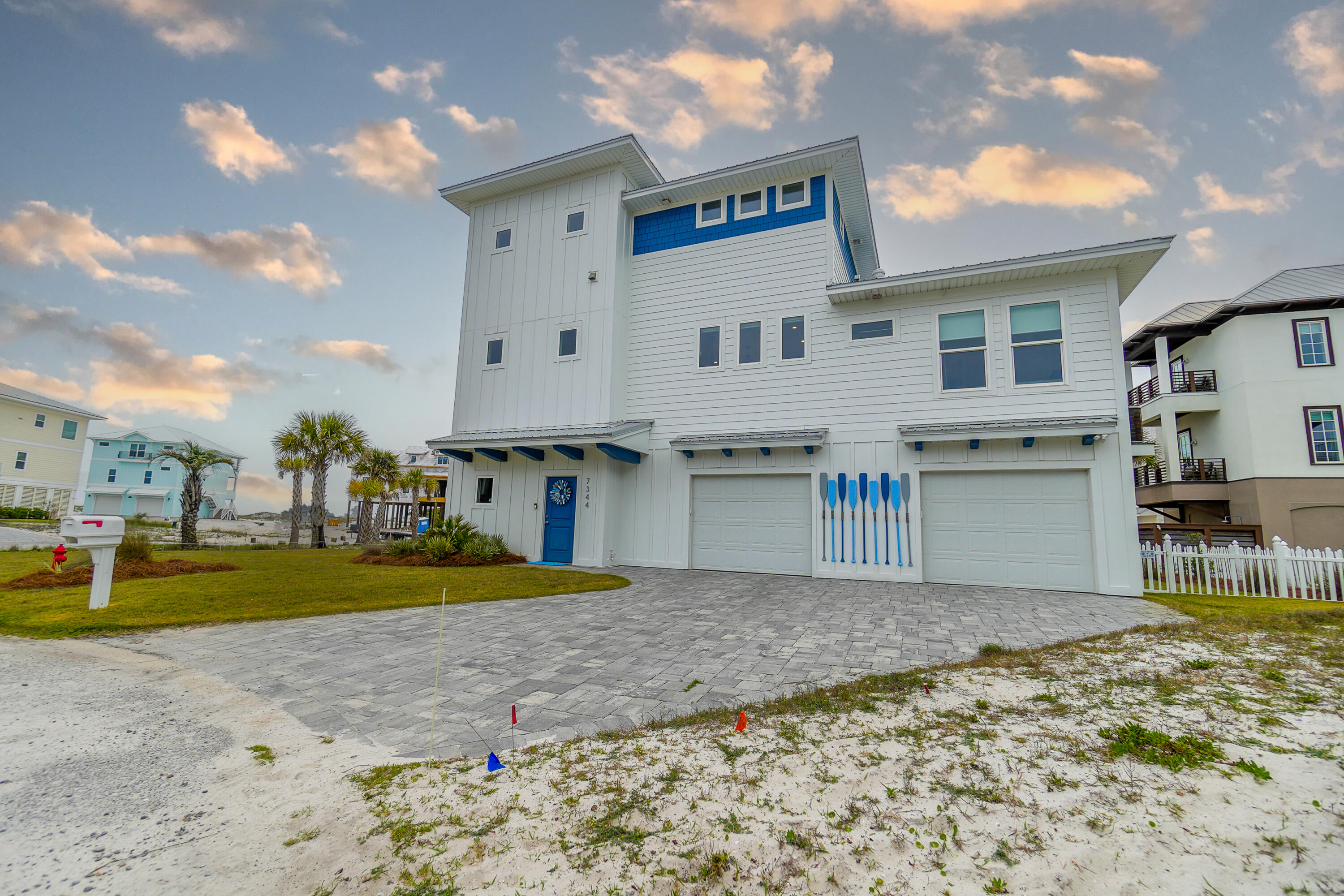 This beautiful, beach home in the gated community. The home includes 3 bedrooms and 3 baths. This house offers an open floor plan with a large kitchen, living and dining area with high ceilings, beautiful and wrap around windows which offer amazing views. The well equipped comes with stainless appliances, and granite counter tops. The master bedroom has an amazing view. The home has balcony overlooking the pool area with a view of the beach. This home has a beautiful stone driveway and grass lawn. This is one of the few houses on Navarre Beach with an actual grass lawn. There is a private beach in the community along the Santa Rosa sound. The community pool is also right next to the front door. Come live here full time or use it as an investment property.