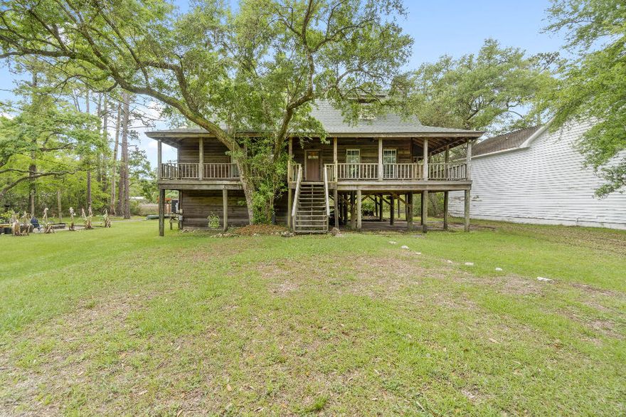 This stunning 3bed 2Bath waterfront property, located on Raccoon Bayou, is perfect for those seeking a peaceful retreat in nature. Recently updated, it has a new roof, 2 new AC units, a new HWH and more. The upper level of the home features two guest rooms, 1 full bathroom as well as a loft area. Downstairs, you'll find large living areas with floor-to-ceiling windows that offer breathtaking views and allow natural light to flood the space. The 3/4 wrap-around porch is perfect for enjoying your morning coffee or entertaining guests while taking in the epic sunset views. Sit by the fire pit or fish on the dock. Boat, jetski or paddle to Escambia Bay, Pensacola Bay or The Gulf of Mexico. YOU DO NOT WANT TO MISS THIS OPPORTUNITY!!