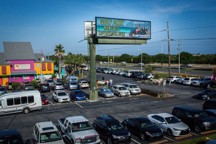 Electronic billboard, purchased and installed in 2010, located as an outparcel to Fudpuckers Restaurant in Destin, Florida, with impressive read seconds, fronting Highway 98, aka, Emerald Coast Parkway, yielding a daily traffic count of 46,000+. This rare and high visibility opportunity includes (2) high quality WATCHFIRE digital billboards, measuring 10'H X 36'W X 8D with wireless module for your remote programming. Sales contract and closing is contingent upon closing of related property, MLS# 729778.
