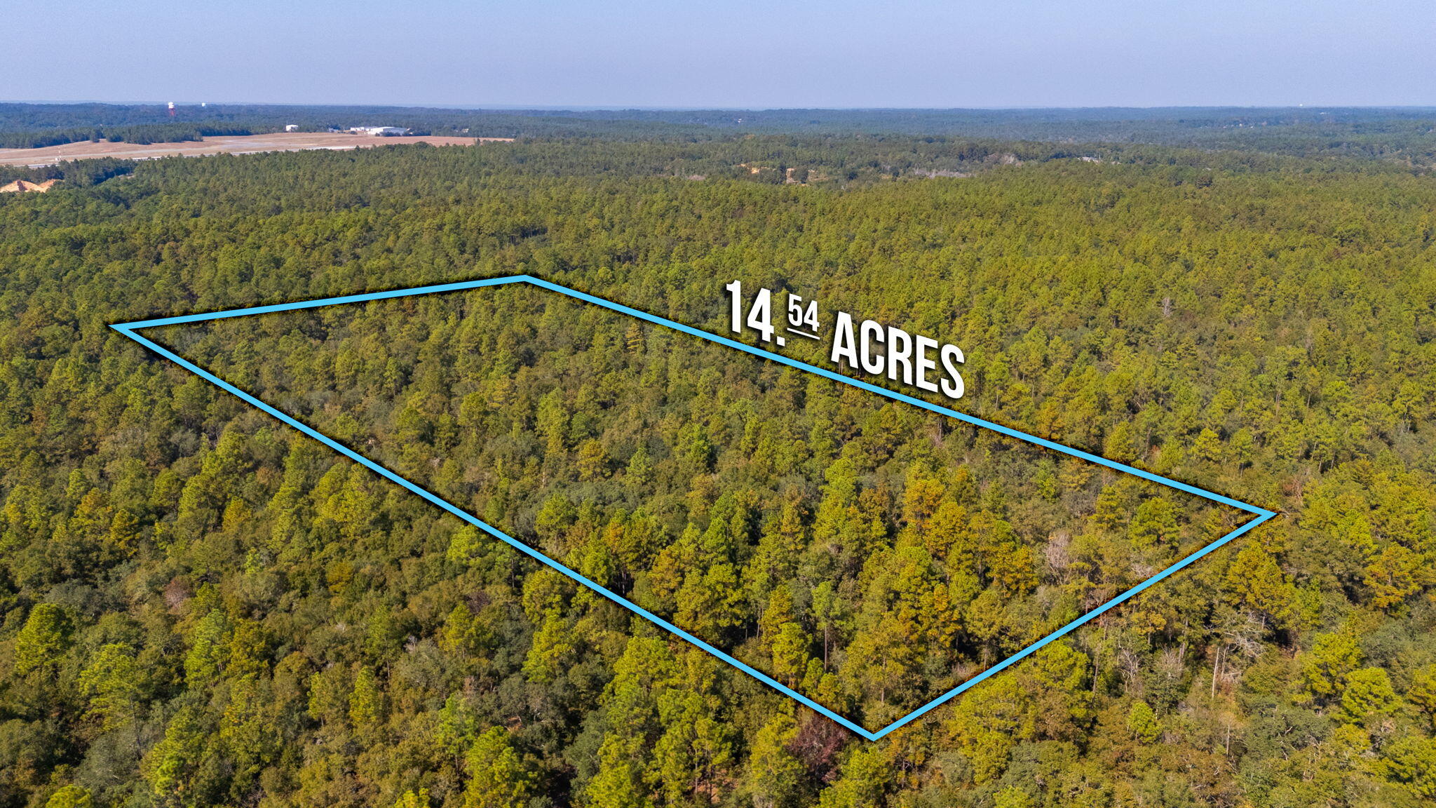 ACREAGE NEAR TOWN!! Check out this 14.54 acre wooded parcel with a great deal of privacy and seclusion. The parcel is close to town - schools, shopping and restaurants - but has a very rural feel to it.