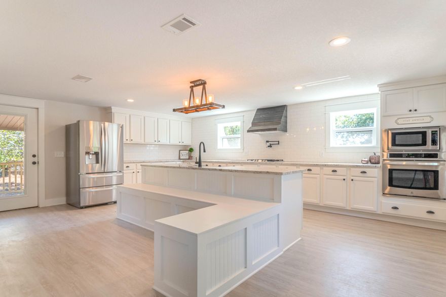 ***BE STILL, MY BEATING HEART!***This is a MUST see. This house checks all the boxes- with style. LARGE eat-in kitchen with ALL the FARMHOUSE feels. Apron Front Sink, wood accents, and the staple white SUBWAY tile. Enjoy cooking again with your GAS cook-top and oven/microwave combo wall unit. A large WHITEWASHED FIREPLACE separates the living room and kitchen which gives the house an ideal flow. Perfect for entertaining. The Modern Farmhouse stair railing ties the theme together. The Finished basement boasts a built in sound system and entertainment center. The real treat is the MASTER BATHROOM. You enter through a BARN DOOR into an oasis with a claw-foot tub and a DESIGNER shower. The details in the house are unmatched-designer finishes, a TWO car garage,bonus area all on an OVERSIZED lot