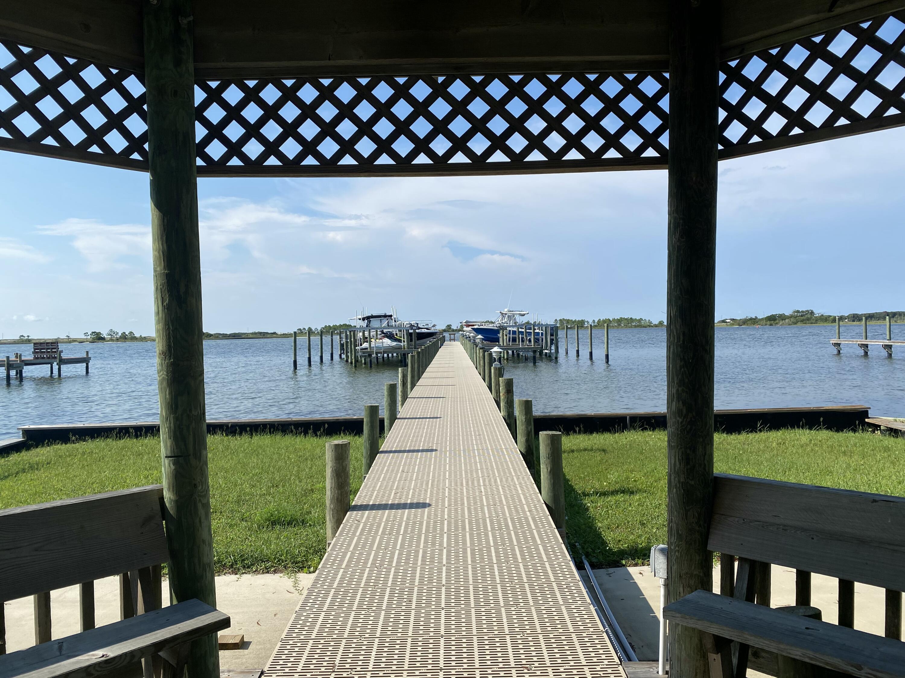 WATERFRONT LUXURY ON THE SANTA ROSA SOUND! Nestled on the Santa Rosa Sound with full Gulf access--no flood insurance required--this updated coastal home offers the ultimate lifestyle. Enjoy your private deeded deep-water boat slip, a peaceful community gazebo, and stunning sunsets. Featuring a new roof, new HVAC, fresh paint, and all-new stainless steel appliances. Spacious 4-bedroom layout with bonus room, generous kitchen, formal dining, and abundant storage throughout. The property is a great start for a master gardner with many blooming plants and an in-ground sprinkler system. Ample space to add a pool! Minutes to bases, beaches, schools, shopping, and restaurants.(Buyer to verify all measurements.)