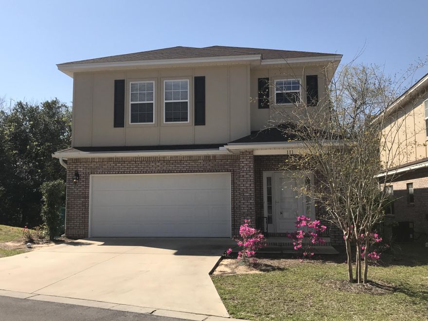 This home is made for families! Built on the largest lot in the neighborhood, this 4 bedroom, 2.5 bath home features upgraded hardwood floors, granite on all surfaces, large laundry room with cabinets and utility sink, double vanities in both full baths and lots more! The back deck is completely screened and has a covered patio space with fans. HOA covers lawn maintenance of the front and back yard and sprinkler system. Freshly painted and ready to move in!