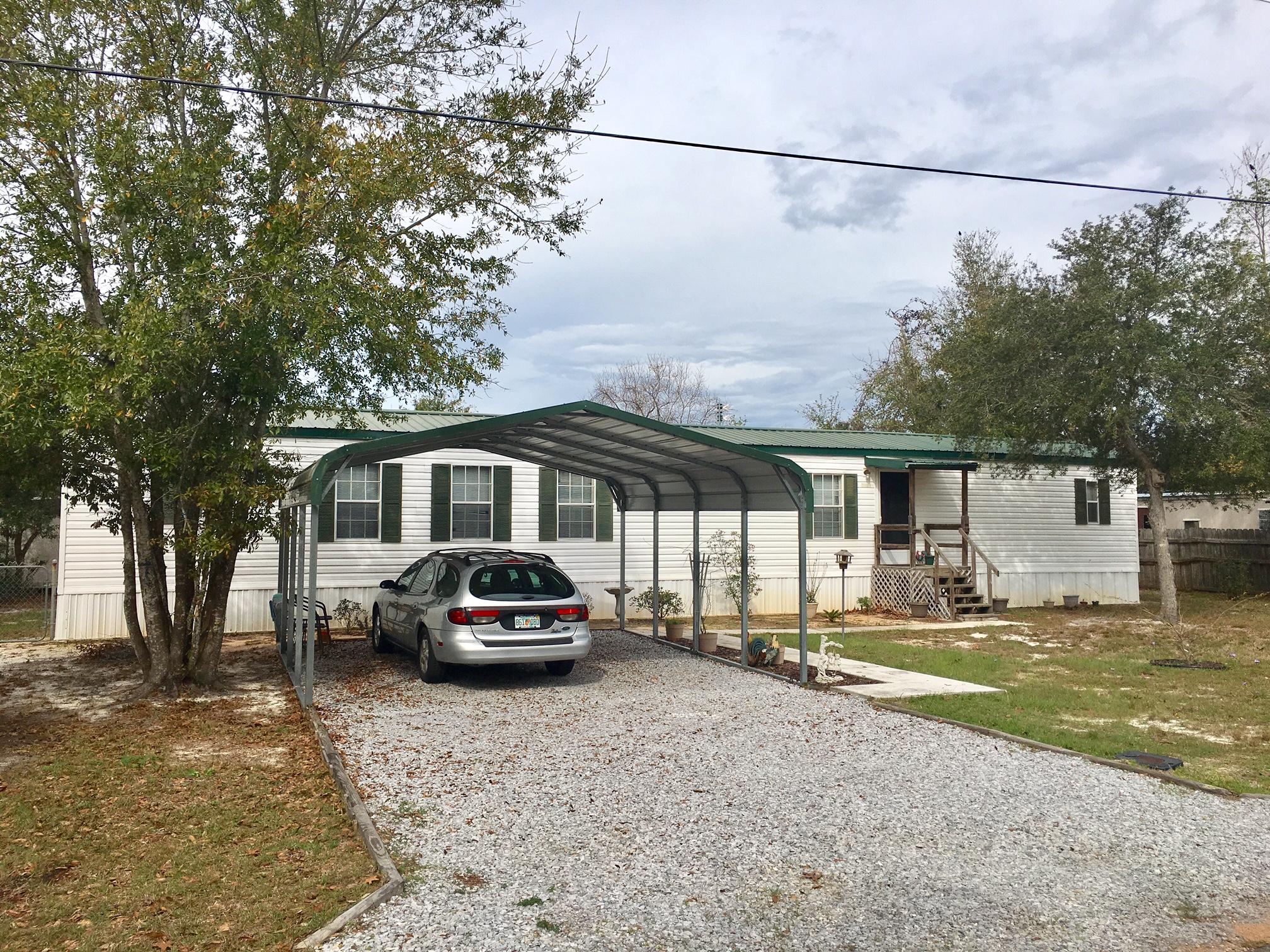 This is a beautifully maintained 3 BR 2 BA Mobile Home sitting on a large lot. This is a great home or opportunity for an investor for purposes of rental property. The Owner has taken pride in the home. It is immaculate and very clean! The backyard is fenced and has a yard building. See to appreciate.