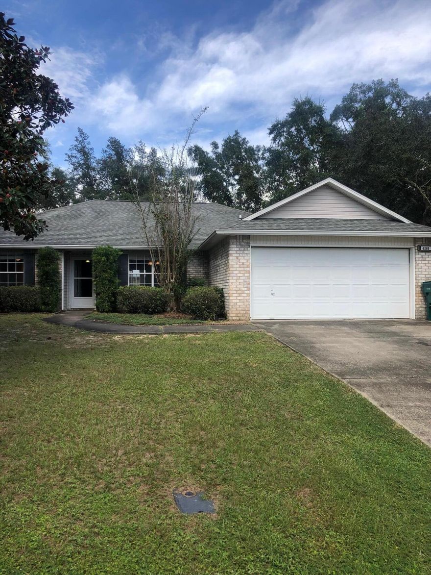 This lovely brick home nestled in the serene Shadow Oaks subdivision is perfectly located to just about everything you need.   The kitchen sports a convenient island and stainless steel appliances. The floors are covered with neutral tile complimented with upgraded dark walnut wood laminate flooring. This home wont last.