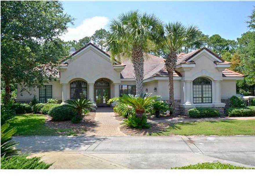 This home is located in the Founders Preserve Area of Regatta Bay. Entering the front door there is a magnificent view of the pool area through floor to ceiling glass walls in the open living room. The dining room and office are adjacent to the entry foyer. The floor plan offers a seamless flow through out the home. New granite counter tops have been installed in the kitchen. The kitchen features new, top of the line, Whirlpool Stainless Steel Appliances, a large island and work desk next to the walk in pantry. The oversize den features a surround sound system. The billiard room opens to the Summer Kitchen and pool area. The upscale AMF Playmaster pool table conveys. The outdoor kitchen features a granite counter top, GE Electric Grill, and an under-counter, Refrigerator.