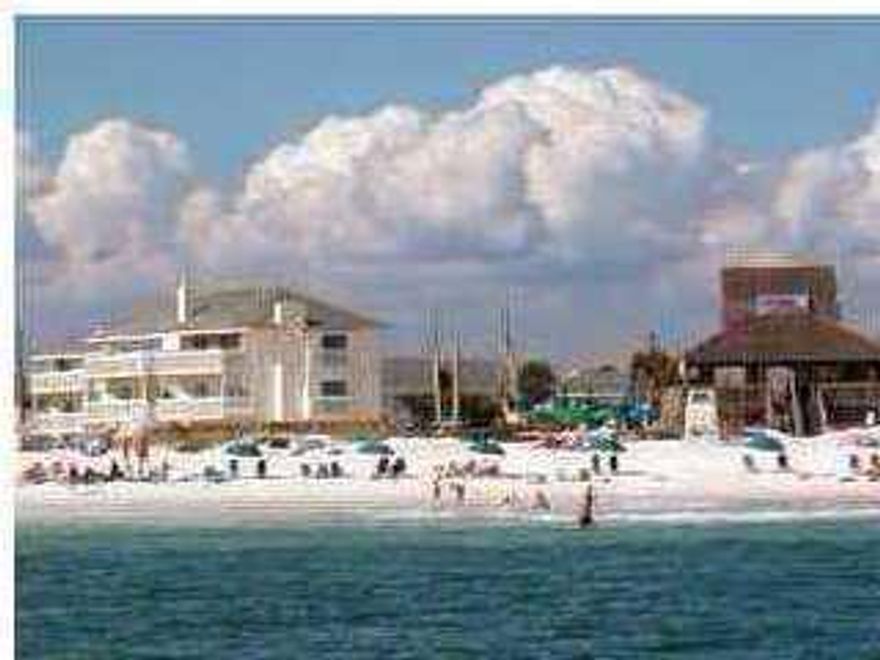 Canal Front Two bedroom/two bath condo just steps away from the sugar white beach and beautiful Gulf of Mexico! This unit is furnished and rental ready. SPC is a medium density residential style condominium property occupying 43 acres in the heart of Destin. Amenities include 1100 ft of private beachfront w/seasonal beach service/snack bar, five pools, six tennis courts, canal boat docking, security, marina, on-site fine dining restaurant, and a nine hole par 3 pitch and putt golf course. SPC is located within walking distance to numerous upscale shopping areas,restaurants,and other attractions.