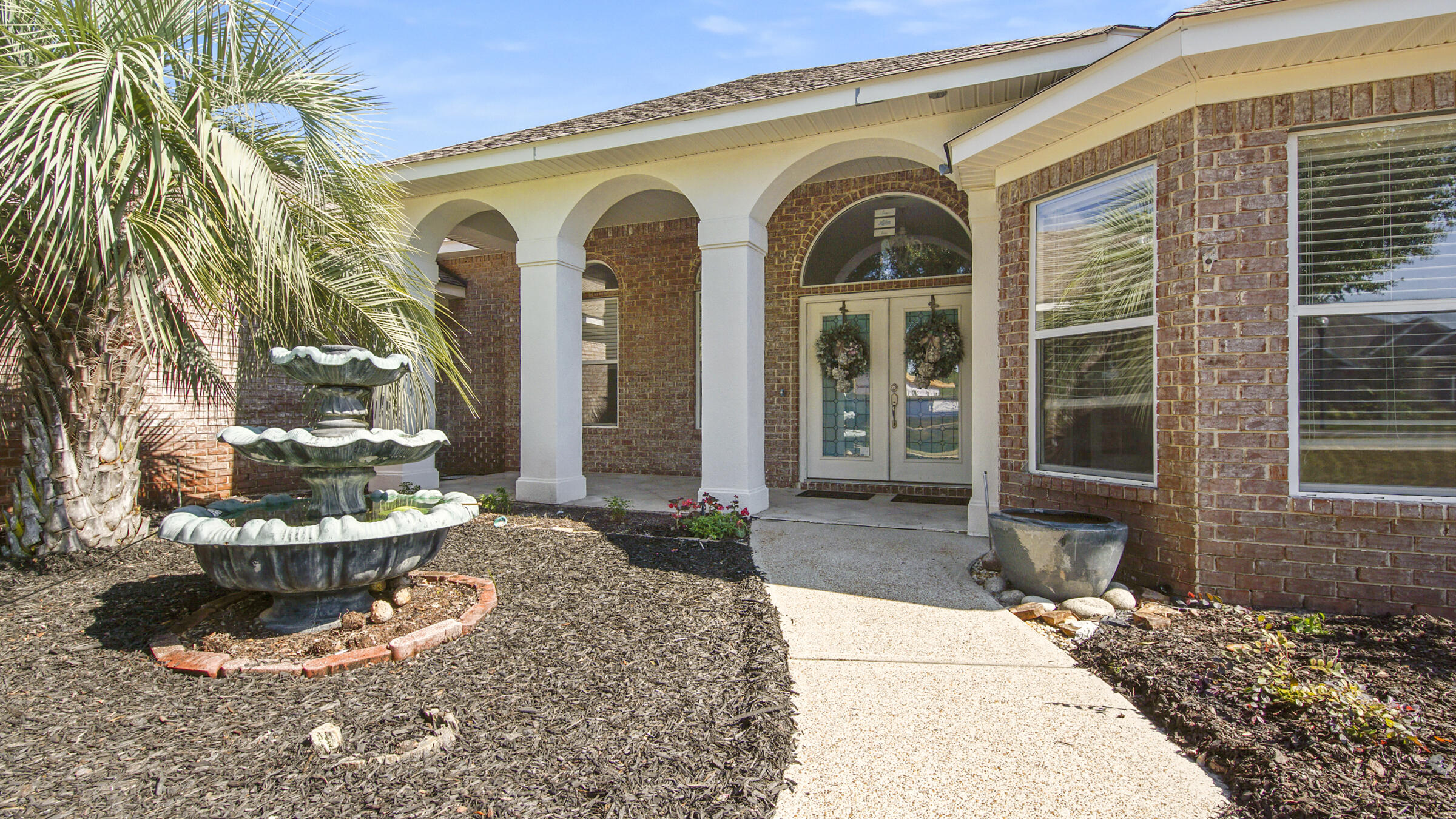 Welcome to the beautiful gated, golf community of Windswept Estates in Freeport! This socially active community is only 35 minutes to beautiful sugar white sand beaches on the Emerald Coast. Breathtaking open floorplan, hardwood floors, in-ceiling speakers, large outdoor patio w/built-in gas grill - an entertainer's dream! Enjoy your fenced backyard that backs up to the 1st hole of the Windswept Dunes 18-hole golf course. Room for a pool! Great split floor plan w/master and office on one side and two bedrooms and two full baths on the other. Office could easily be 4th bedroom. Spacious 3-car garage for tools, toys, and golf cart! Tankless water heater allows for endless hot showers. New 5T HVAC Amenities include resort-style pool, club room, tennis, basketball, and playground.