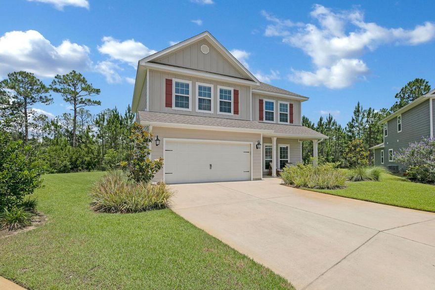 This home is BETTER THAN NEW when you see all the upgrades and extras this property offers.  Move-in ready on a premium lot in a quiet cul-de-sac, this 4 bedroom home boasts a spacious 2,496 square feet of living space within walking distance of the community pool. A large kitchen with a generous pantry and breakfast bar flow into an open-concept great room with Shiplap focal wall. Owner's suite is situated on the first level and offers large walk in closet and master bath complete with double vanity. 3 additional bedrooms, 2 full baths, laundry room with washer and dryer included, and a large upstairs living room perfect for a playroom or entertaining complete the upstairs. Let's talk upgrades!  Sellers have added a sprinkler system and well for irrigation, rain gutters, coated concrete on back patio and garage, screened porch, all appliances are included, blinds, and updated lighting throughout the home. Now for 'Location, Location, Location! This house is less than 3 miles from 30A and the beautiful emerald coast. It is also just 4 miles from Grand Boulevard and Baytown Wharf, where you will enjoy great restaurants, shopping, 3 golf courses, lots of family fun, and get your groceries. For those water adventures, you are a mile away from launching your paddle boards and kayaks, and great fishing in the bay. homesite offers a great back yard with outdoor paver area where you can enjoy sitting by the fire, grilling and just relaxing in the tranquil setting overlooking a pond and natural forest. Homeowners can also enjoy the outdoors from the comfort of a screened in spacious patio with TV for GAME DAYS gatherings. Eagle Bay Landing also offers a low quarterly HOA fee that includes high speed internet and cable.