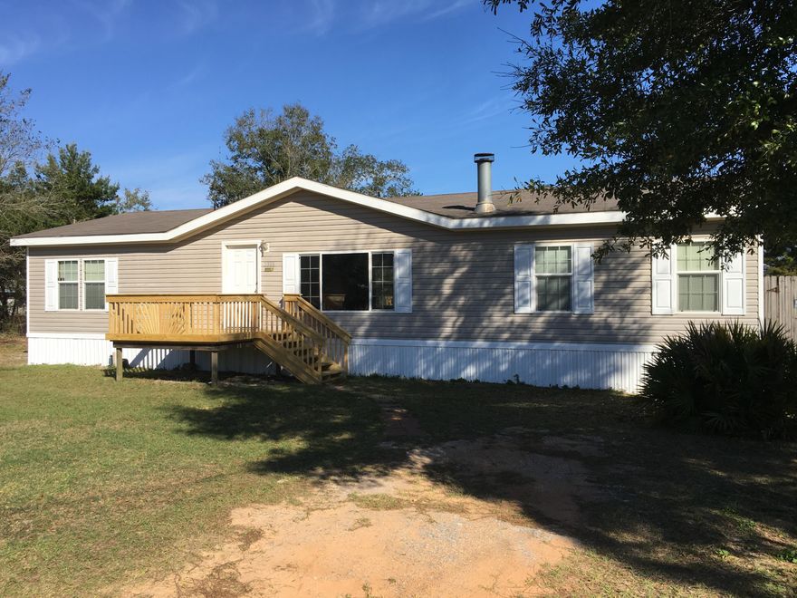 Where else will you find a HOME in MOVE IN READY condition and GREAT shape at this price? NEW: Whirlpool Fridge, Stove/Oven and Dishwasher. NEW: Carpet and Front Door! The interior has been freshly painted and a NEW deck has been build on both the front and back of this home!
UPDATE: The skirting conforms with HUD/FHA financing standards (Apr 2019) and qualifies for financing!
This 3 bedroom 2 bath all electric home has both washer/dryer connection AND a wood burning fire place.
There is a 20 year warranty on the roof that was built in 2006 and it looks good!
Financing? Call a Realtor for details on who can finance it for you!
The seller has it READY so it is being sold AS IS.
Zoning for this property is RIM: Mixed Residential Subdivision
Make this home yours now