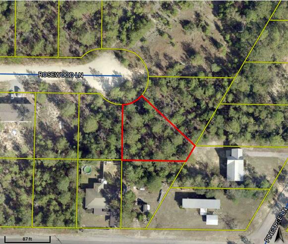 Charming vacant wooded lot on county maintained road that allows you the opportunity to clear it to fit your future dream home. Prime development opportunity! Located in flood zone X.  Great Location with No HOA Fees! Ideal for building your dream home or setting up a mobile home. This vacant lot offers convenient access to major highways such as I-10, 331, and 90. It is located just miles from hardware and grocery stores, schools, downtown, and the captivating historic Defuniak Lake. You'll be thrilled to discover the abundance of outdoor activities nearby, including fishing, golfing, national parks, and the beautiful beaches of the Emerald Coast. There are NO utilities in place. POWER: Available in the area. WATER: It would be public water. SEWER: It would be Septic.