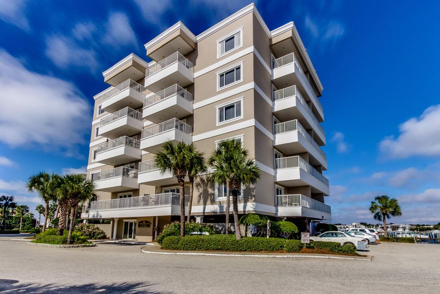 This harbor front condo is a must see! This unit at Sun King Yacht Club sits just outside of the beautifully updated unit. Sun King Towers is located on Holiday Isle, in a quiet and secluded setting on the harbor. Come home to gorgeous views of the harbor and canal, just moments from the white sand beaches.
Interior updates include a beautiful, newly renovated kitchen with thick granite countertops & island offering a breakfast bar for casual seating. There are also ample cabinets, unique mosaic tile backsplash, stainless steel appliances and custom lighting. Tile floor extends throughout the unit for easy beach living! The master bath has also been updated with granite and tile backsplash in the shower. New AC and washer/dryer as well as fresh pain This unit has been updated top to bottom and is being sold furnished and turn key! Sun King is a low density complex with 44 units in two buildings. Next door is a large marina, clubhouse, and plenty of parking. The entire project underwent a complete upgrade between 2006-2007; new roofs, impact doors and windows, new railings, redone landscaping, and all new stucco; both paint and seal. There are also plans for a gate before the end of 2019. Holiday Isle is desirable community conveniently located alongside Destin Harbor and downtown Destin. All of the best attractions are nearby and even accessible by Destin's popular boat taxi service. This is a perfect spot for a 2nd home or permanent residence....just bring your family and your suitcase! 

*Sun King Towers has boats slips assigned on a first come basis. The dock master assigns boat slip according to boat size*