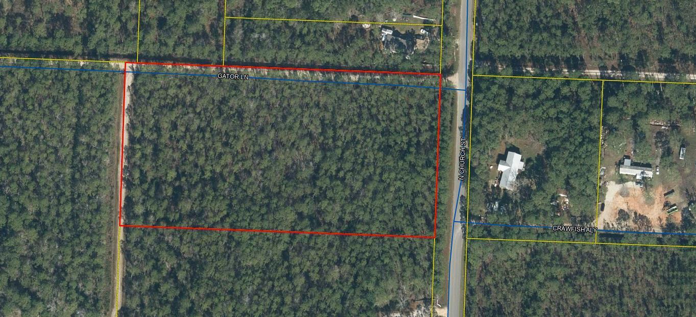 Great opportunity! This 5 acre parcel can be divided and has access on Church Street and Gator Lane. Great area, paved road, quick access to everywhere.