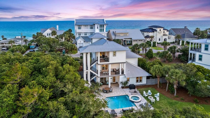 Important.....Adding to its investment appeal, the property already has more than $115,000 in rental income secured for the 2026 season ,beginning March 7. A stunning three-story luxury vacation home located in Old Blue Mountain Beach, this exceptional property offers 4 bedrooms, 3.5 baths, and comfortably accommodates up to 14 guests. The home features private, deeded Gulf of Mexico beach access, ensuring it is not impacted by Florida's Customary Beach Law. Guests receive lanyards providing full access to all neighborhood beach entry points, located just a two-minute walk away.  Designed for both relaxation and entertaining, the outdoor oasis is one of the largest along Scenic Highway 30A, featuring a heated pool, hot tub, and gas fire pit, along with more than 800 square feet of covered porches ideal for year-round coastal living.

 Ideally situated in a charming, laid-back neighborhood, the home is just an eight-minute drive to Seaside conveniently close to Gulf Place and Grayton Beach. 

Within a mile, owners and guests enjoy access to top-rated restaurants, bakeries, live music venues, and local shopping.

 The home is also located across the street from the Gulf, on a highly desirable street where Gulf-front properties have recently sold in the $6-$13 million range, further underscoring the strength and prestige of the location
