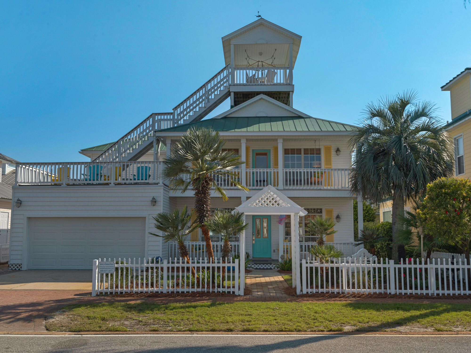 Introducing ''Stairway to Hammock Heaven,'' the epitome of coastal living. This exquisite retreat offers guests a collection of calm spaces to gather and rest, each with a coastal decor theme and every detail thought-out. An outdoor oasis awaits; private heated pool and spa with an outdoor kitchen and dining in the backyard, a porch off every bedroom, and a third level crow's nest with hammocks perfect for sunsets galore.  An entertainer's delight with a built-in banquette breakfast nook, renovated chef's kitchen with island,  dining room, outdoor lounge areas on every level. Primary suite with marble countertops, double vanities and a giant walk-in shower, bedroom and ensuite bathroom on the first level with two guest bedrooms upstairs, one with built in bunks plus trundle bed in living. Work from home with two desk areas on first floor.  Upgraded with tile flooring throughout and offered fully furnished including all accessories. Attached two car garage enters into an oversized mud/laundry room with washer/dryer and a sink perfect for quick clean up with pets or after the beach. Mature landscape with seasonal vegetation, walking paths, front picket fence and entire yard with privacy fence for added security. The community features a community pool and a quick walk to beach access. The neighborhood is filled with a mixture of full time, part time and vacation rentals with strict covenants for enjoying whichever lifestyle you choose. The community of Crystal Beach is the perfect location with plenty of sidewalks, golf cart friendly roads and close to shopping, fishing, dining and entertaining. 