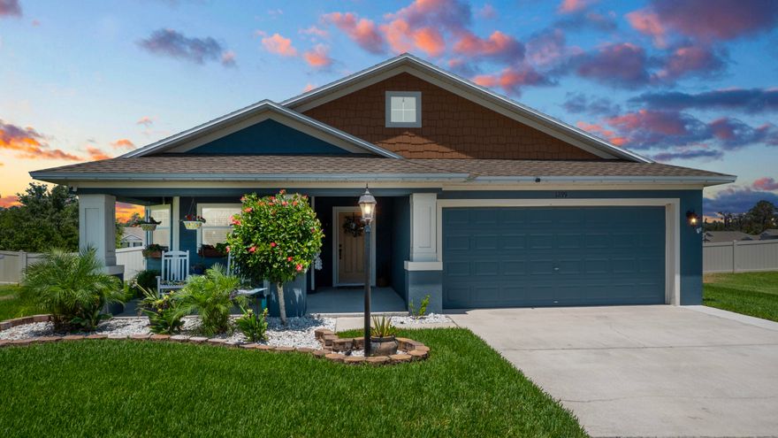 Welcome to your dream home! This stunning 4 bedroom, 2 bath sanctuary nestled in a quiet cul-de-sac offers the perfect blend of elegance and comfort. Step into luxury with a custom pebble tec, salt water, heated pool featuring a ''beach - sun shelf'' area and expansive brick paver deck, all enclosed in a screened-in cage for year-round enjoyment. The 23 X 14 pool beckons for a refreshing dip, while the 7 X 6 beach - sun shelf area provides a tranquil spot to soak up the sun. Inside, upgrades abound, including a master bathroom retreat with a garden tub, dual walk-in closets, and his and her sinks. ''Wood'' tile flooring throughout the main living areas adds warmth and sophistication, while the vaulted ceilings create an airy ambiance.