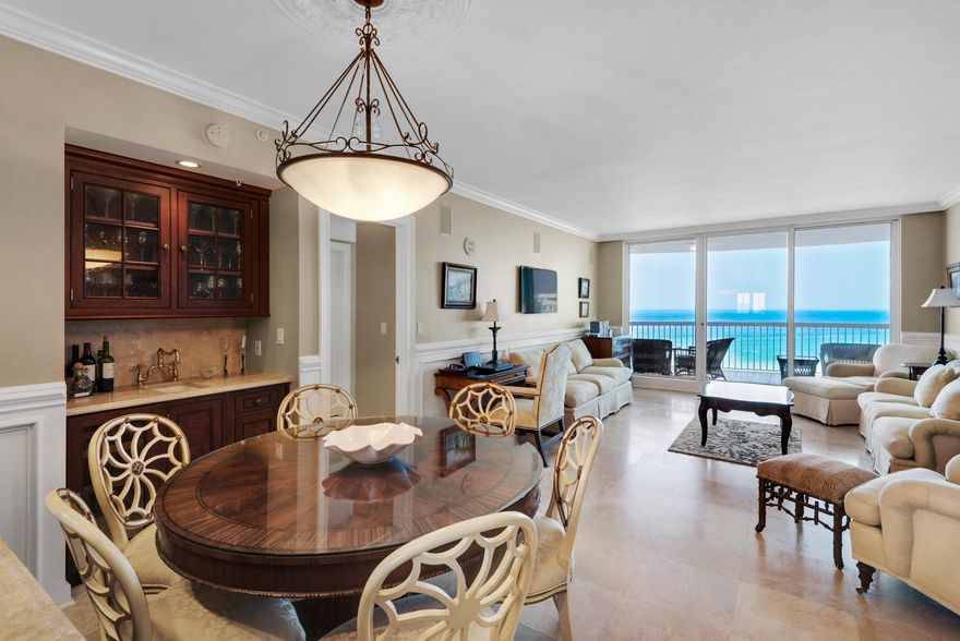 BEACH ELEGANCE AT ITS BEST! This three bedroom, three bath condo is St. Thomas's most popular floor plan featuring spectacular gulf views from every room. The unit is beautifully furnished with high quality furnishings. The gourmet kitchen features exquisite cabinetry, high end appliances, hard surface counter tops and an array of extras. The master suite offers a wonderfully appointed luxury bath and a spacious walk-in closet with quality built-ins. Each guest room has its own private bath. Other features include: travertine floors, wet bar with wine cooler, surround sound, deeded garage parking, remote controlled window shades, custom draperies and a climate controlled storage space. St. Thomas is a premier rental restricted building with an elegant lobby, library, private beach side