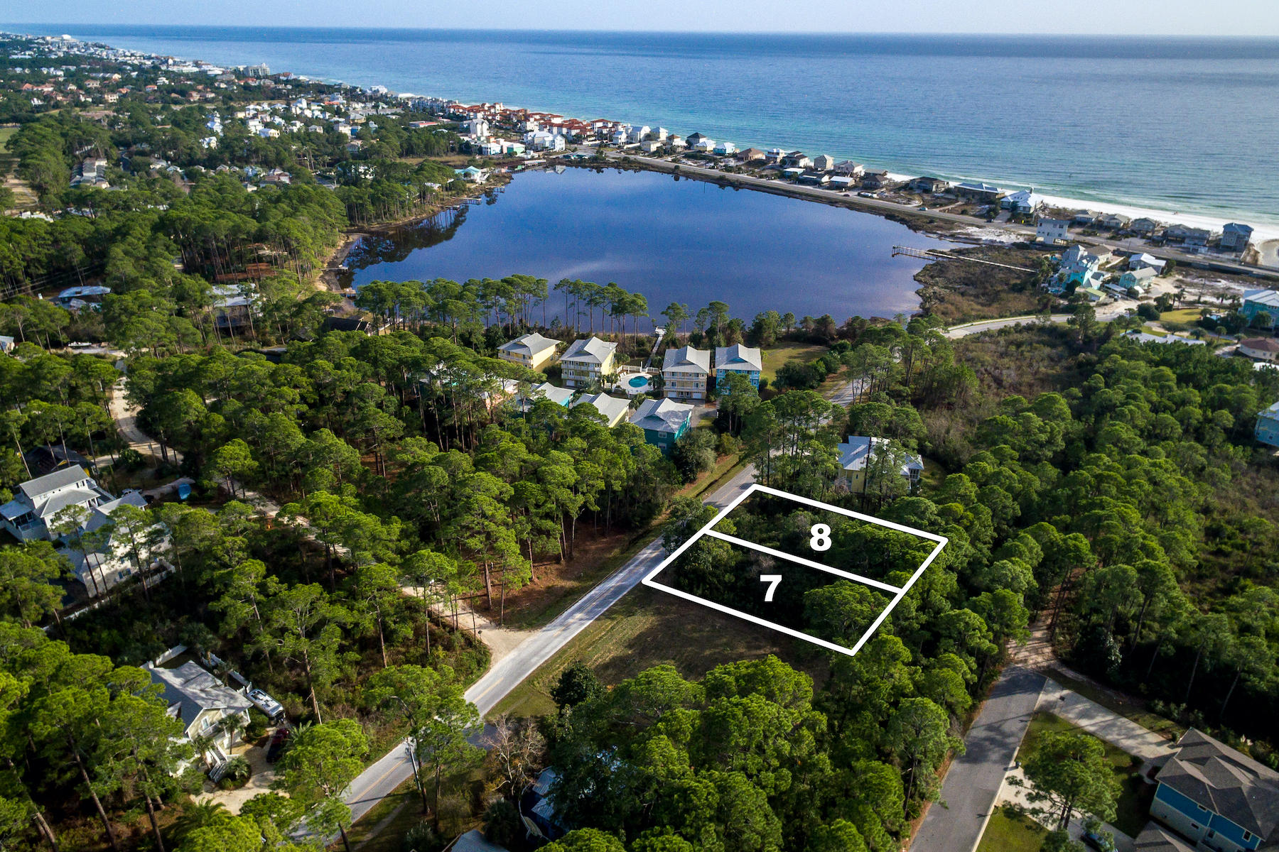 Level building lots near Oyster Lake on the quieter west end of 30A. Possible coastal dune lake and Gulf views. Located just a short walk from multiple beach accesses and very close to the heralded Santa Rosa Golf and Beach Club. Each with 75 ft of frontage and average 140 ft depth these are perfect building lots for your dream home. Conveniently located close to Gulf Place, Grand Boulevard, Publix and Sacred Heart Hospital this location is perfect for a primary, second or vacation rental investment. Adjacent lots also available.