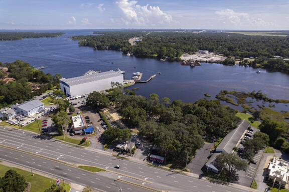 3.65 Acres with 600' of waterfront on Boggy Bayou. Property has a dedicated easement to the traffic light at 85N. and HWY 20E. There are 3 separate rentals on site, all month to month. This listing is for Lots #50, #49 & #48.All measurements and taxes are to be verified by Buyer and their agents.