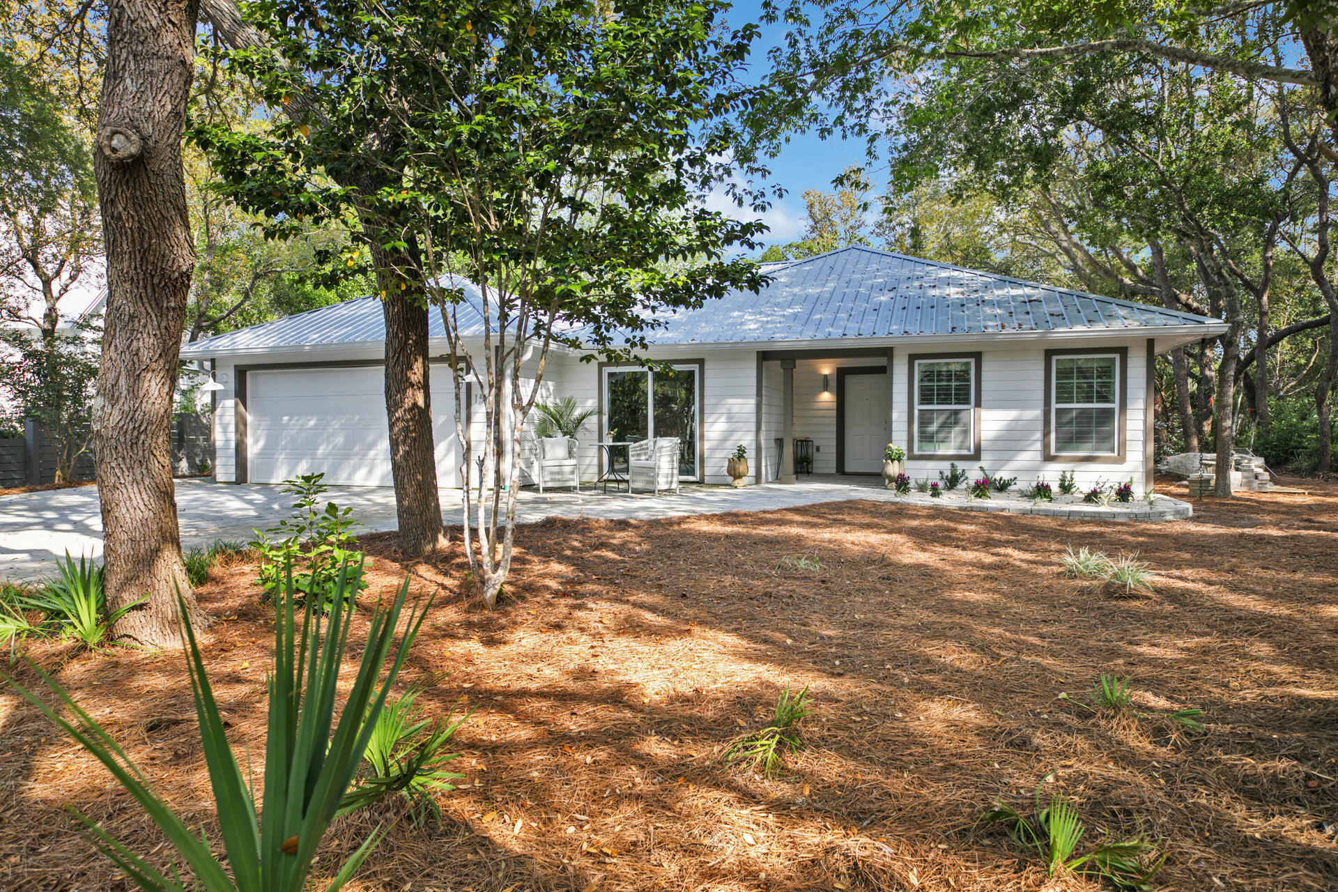 ''Peaceful, easy feeling'' is what you will feel upon turning onto Camp Creek Road South. Located in one of the most sought after 30A east end locations, this beautifully renovated home sits on a large homesite with old growth, hard woods and views of Camp Creek Lake to the west. The home was transformed into an inviting place to live, entertain and enjoy! Recently completed remodel included a remastered kitchen with all new appliances, backsplash to the ceiling, as well as custom cabinetry. All of the bathrooms have been completely redone with custom tile, cabinetry and excellent finishes. New roof, gutters, surround sound system, and a brand new paver system in the driveway as well as the screened-in back porch. With deeded access to one of Walton County's Coastal Dune Lakes, you are steps away from the peace and tranquility of one of the community's rarest commodities. Kayak or paddle across Camp Creek Lake to the the emerald waters of the Gulf of Mexico.
You are but a stones throw away from all your favorite spots along 30A, with all it has to offer. Enjoy dining and shopping along 30A or walk or bike to the Hub for entertainment and a quick dinner.